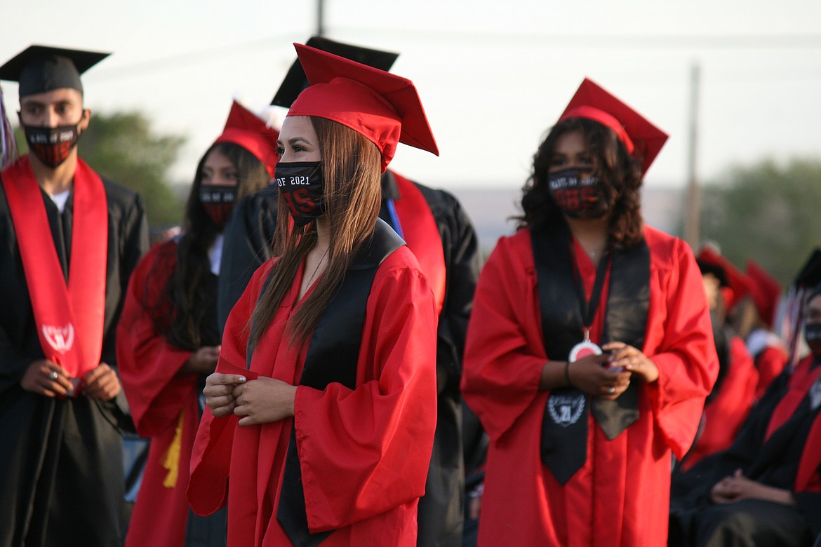 Members of the Othello High School class of 2021 line up to receive their diplomas during the graduation ceremony June 4.