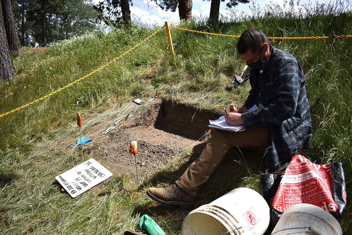 Nicholas Kager, deputy tribal historic preservation officer for the Coeur d'Alene Tribe and University of Idaho student from Worley, at the dig site by North Idaho College.