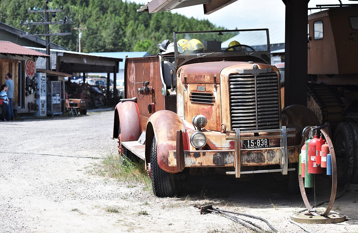A nearby antique fire engine was of no use during Friday's fire. (Scot Heisel/Lake County Leader)