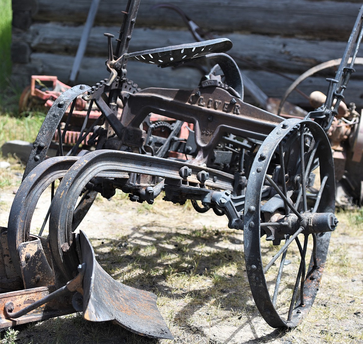 Some pieces, like this Oliver plow that sat unused for years on Wild Horse Island, sustained severe damage. The heat from the fire twisted and bent some metal parts. (Scot Heisel/Lake County Leader)