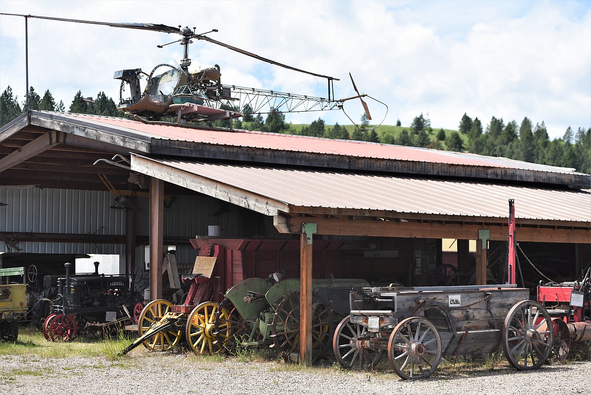 A barn full of antique tractors right beside the agriculture barn received virtually no damage from the fire. (Scot Heisel/Lake County Leader)