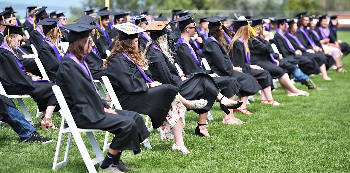 Polson seniors await the presentation of diplomas. (Scot Heisel/Lake County Leader)