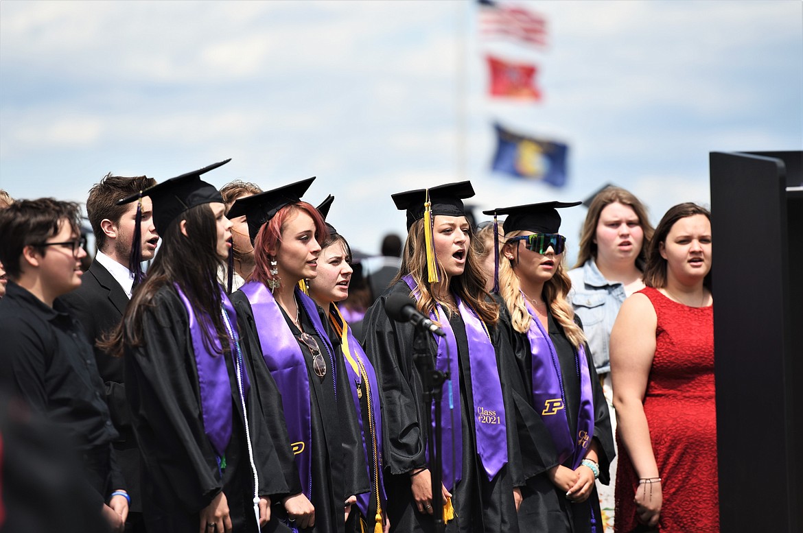 The Polson High School Concert Choir performs the national anthem. (Scot Heisel/Lake County Leader)