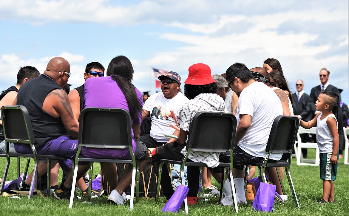 The Badgertail Drum Group performs an Honors Song during the Polson High School graduation ceremony Saturday. (Scot Heisel/Lake County Leader)