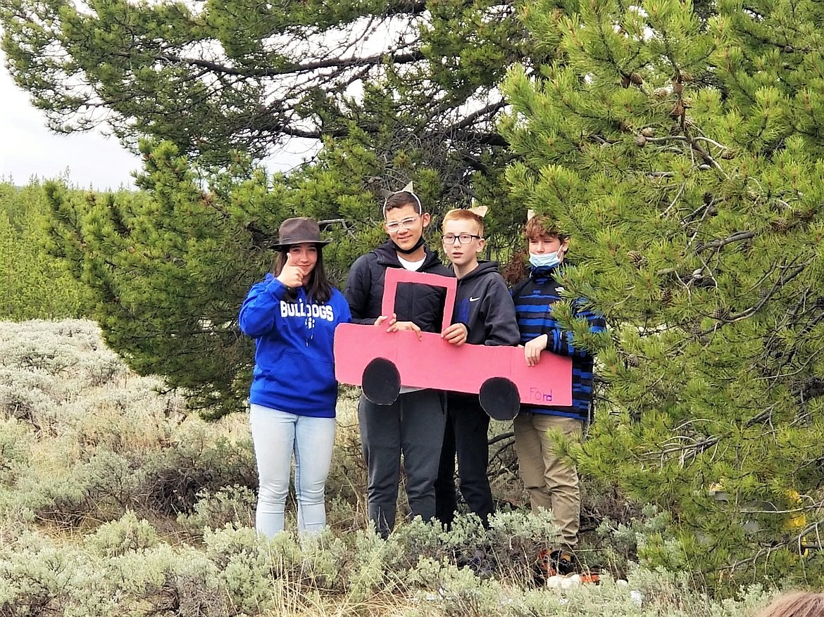 Amelia Cronk, Jose O'Brien, Harlon Leishman and Jack Keast perform a skit about the wildlife of Yellowstone. (Courtesy of Stacey Doll)