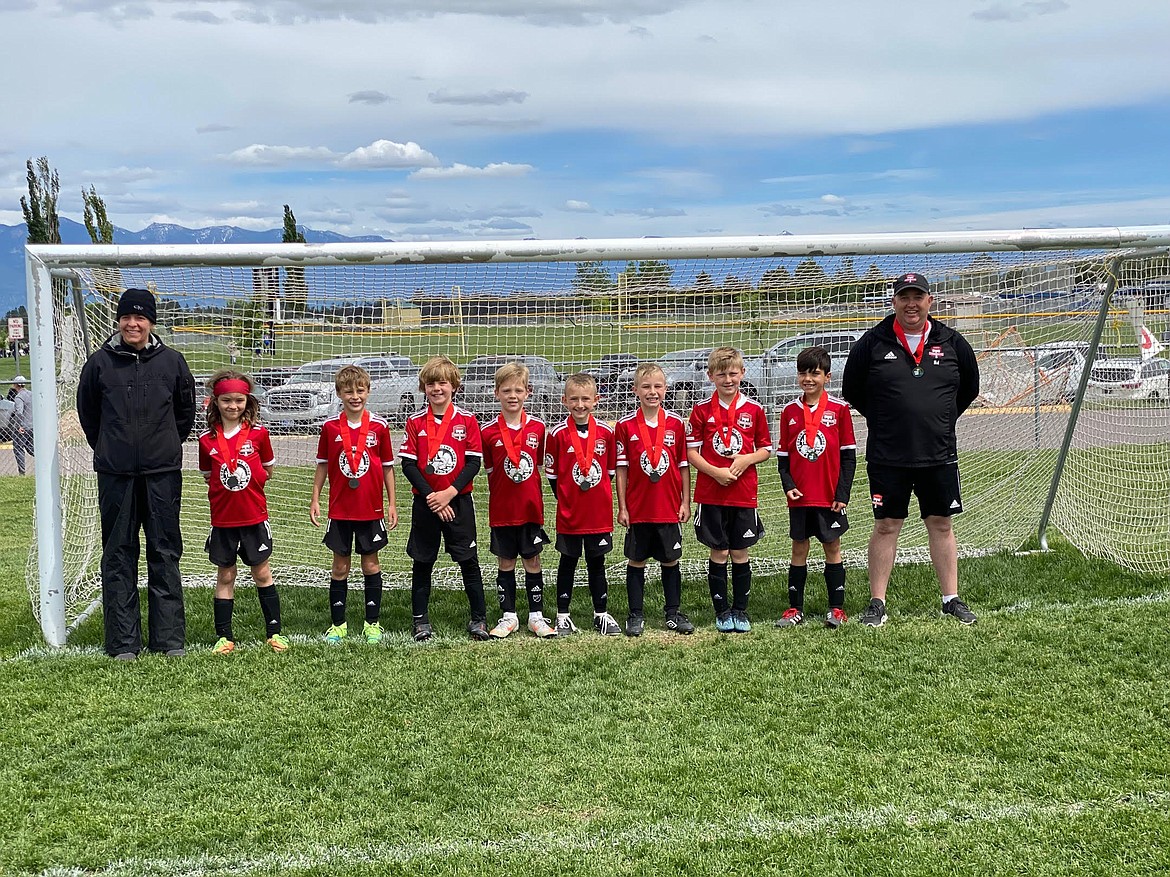 Courtesy photo
The Timbers North FC 2012 Boys Yellow soccer team took second place at the 3 Blind Refs Tournament in Kalispell, Mont., last weekend. From left are coach Jamie Young, Jake Young, Mason Fantozzi, Cooper Nusser, Caleb Wurster, Connor McKenna, Noah Stern, Zach Mittelstadt, Henry Bowlby and head coach Ian McKenna.