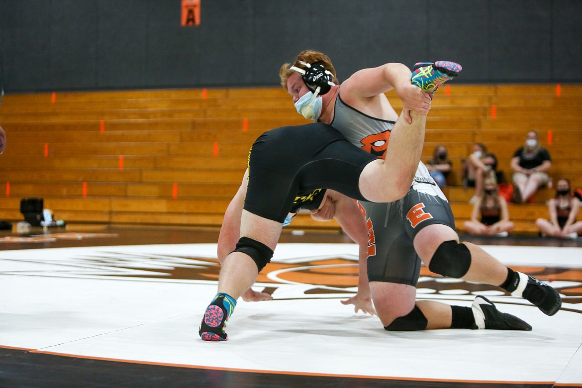 Ephrata High School senior Matthew Keyser struggles to flip Joey Freidig of Moses Lake to the mat Tuesday.