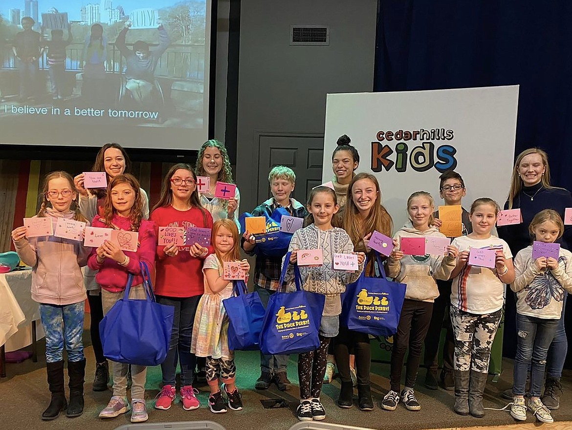 Camille Neuder, sixth from right, takes part in a Be Your Best Self event. Sandpoint's first Distinguished Young Woman of Idaho will be taking part in the 64th annual Distinguished Young Women National Finals in a few weeks.