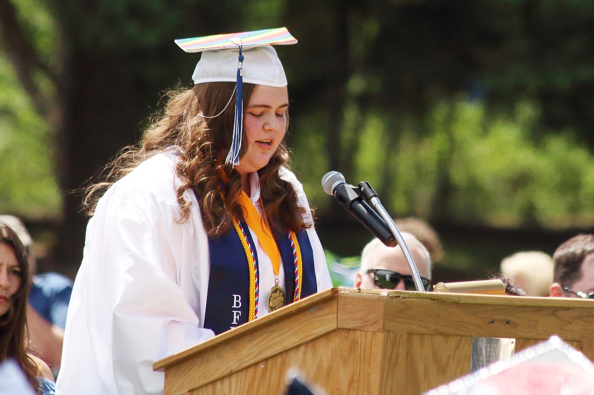 (photo by Victor Corral Martinez)
Co-Valedictorian Regina Claphan giving a speech to fellow graduates.