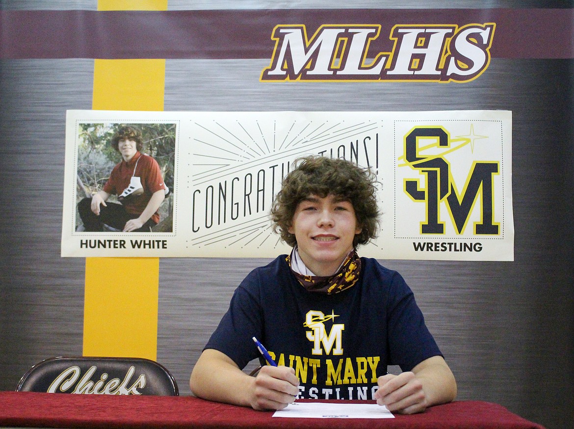 Moses Lake High School senior Hunter White signed with University of Saint Mary to continue his wrestling career on Thursday afternoon at MLHS.