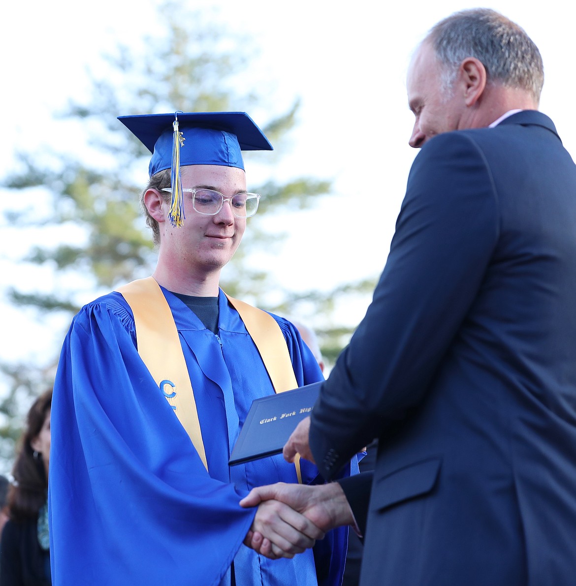 Brice Nickle receives his diploma.