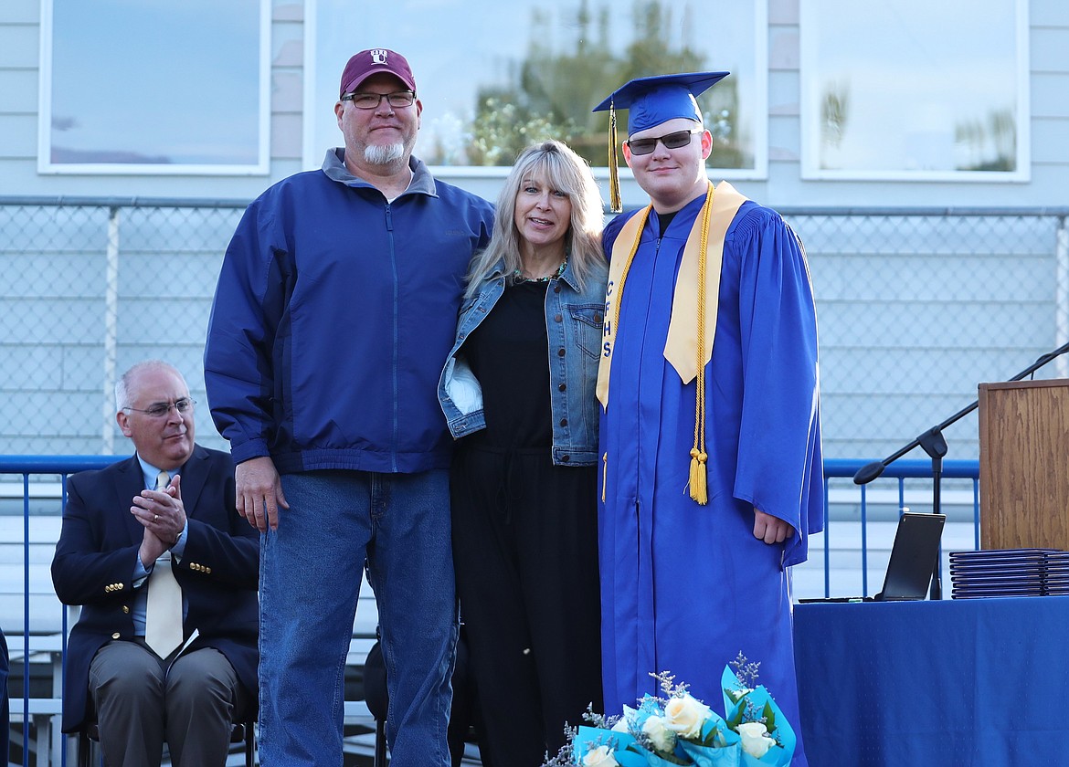 Bryce Beason poses for a photo with family after receiving his high honors cord.