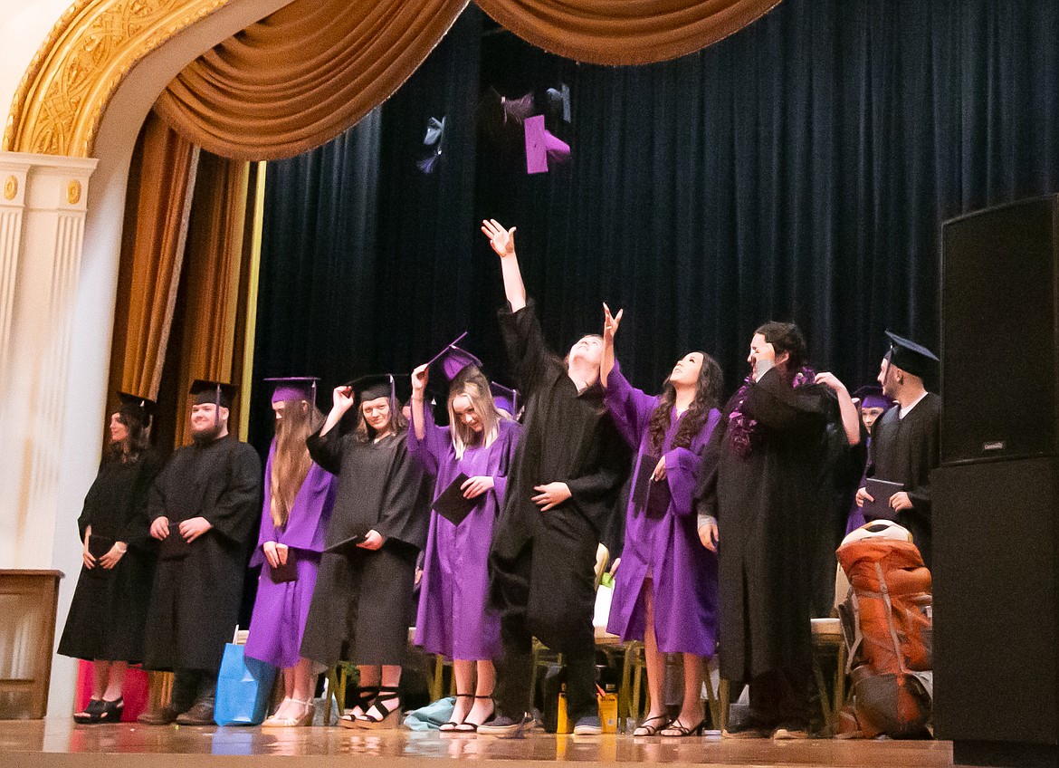 Graduates of Lake Pend Oreille High School toss their caps after a commencement ceremony attended by approximately 300 people. Graduates, staff, and audience members celebrated on June 10 at the Sandpoint Events Center.