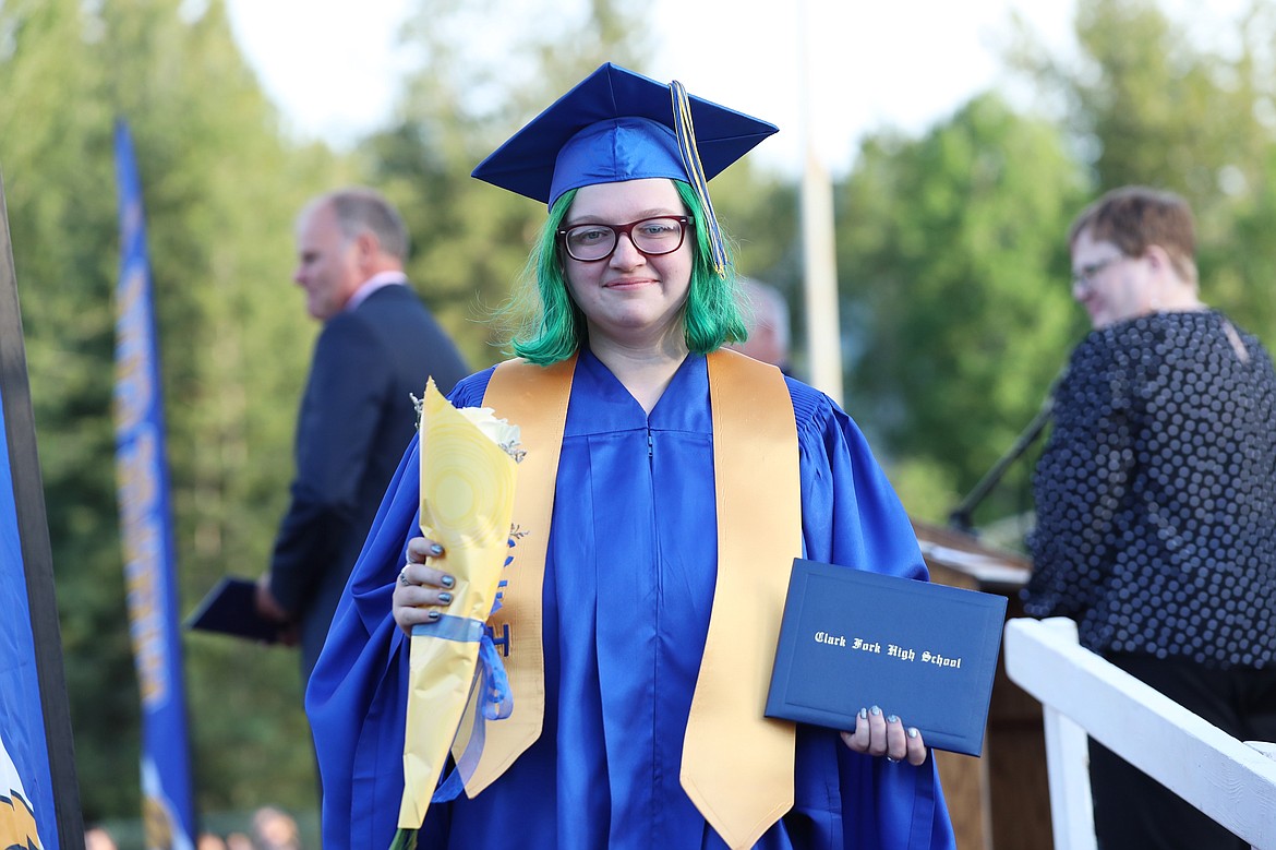 Lilyana McKinney walks off with her diploma.