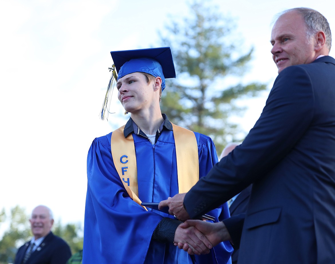 Silas Hay receives his diploma.