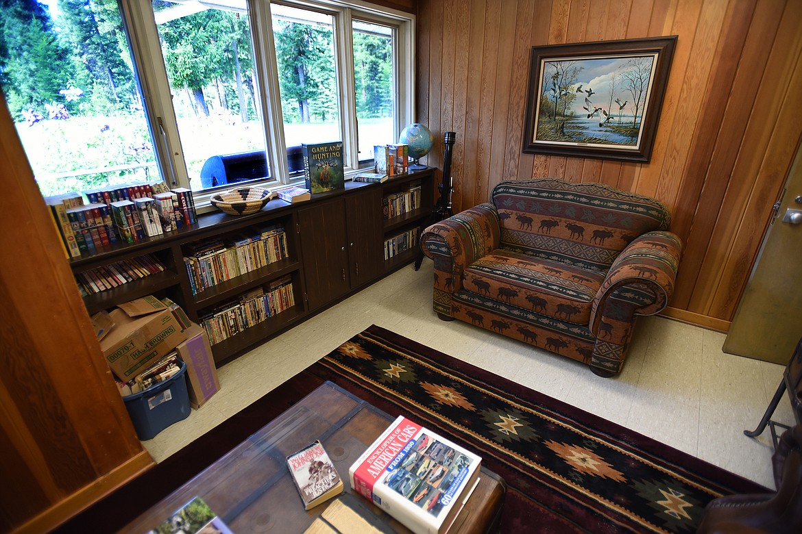 The renovated administration building at Camp Ponderosa offers several bedrooms, meeting rooms and this well-stocked library. (Jeremy Weber/Daily Inter Lake)