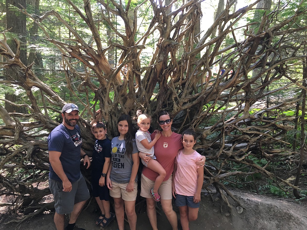 U.S. Army Captain Will Israel is pictured with his wife, Amy, and their four children.
Courtesy photo