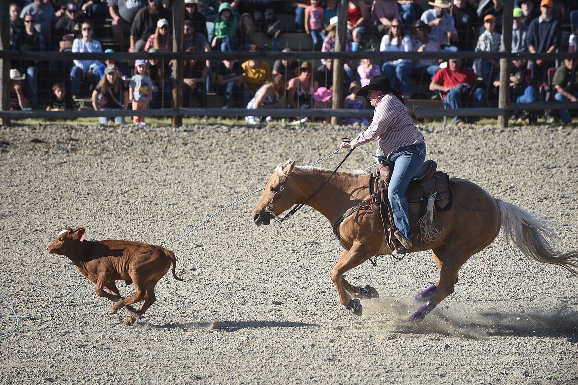 Competitor Jimi Champ tried to lasso a calf during the ladies breakaway event last Saturday at the Hot Springs Rodeo. (Scott Shindledecker/Valley Press)