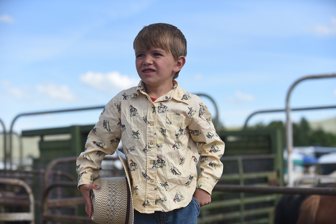 A youthful cowpoke considers the events before him at last Saturday’s Hot Springs Rodeo. (Scott Shindledecker/Valley Press)