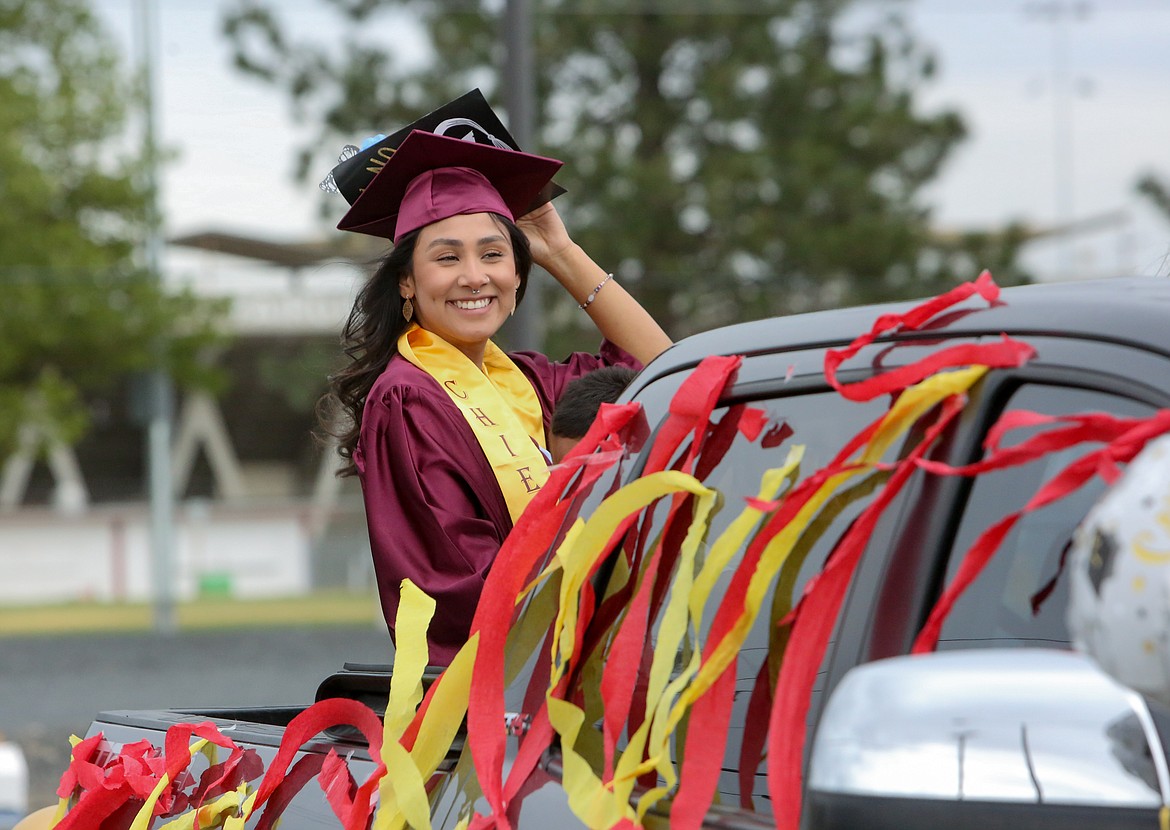 The last 2021 Moses Lake High School graduate leaves the parking lot beside Airway Drive Northeast in front of the Grant County Fairgrounds on Friday afternoon, June 11.