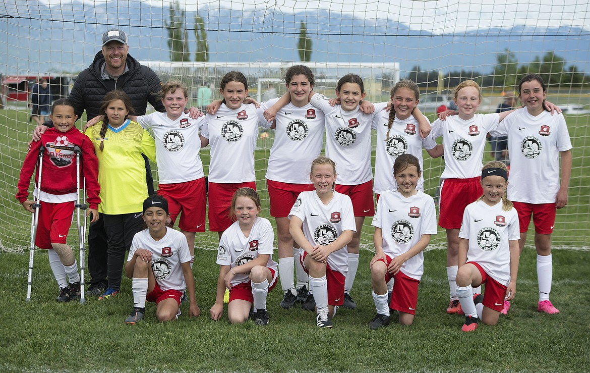 Courtesy photo
The Thorns 2010 Girls soccer team closed out its spring season with a championship at the recent 3 Blind Refs tournament in Kalispell, Mont. The Thorns beat Helena Academy 4-2, tied FC Missoula 4-4 and beat Flathead Soccer Club 3-1 to win their division and advance to the championship game, where the Thorns beat FC Missoula 5-3. Finley Wright scored two goals for the Thorns in the title game, and Callahan Kuhlman, Anya Low and Vivie Moss each scored one. In the front row from left are Anya Low, Chloe Landers, Callahan Kuhlman, Grier Scott and Riley Greene; second row from left, Selah McNiel, Ella Woods (keeper), Jordyn Walker, Denisa Kohoutek, Emily Tanneberger, Vivie Moss, Finley Wright, Avah Archibald and Kendalyn Bowlby; and rear, coach Scott McNiel.