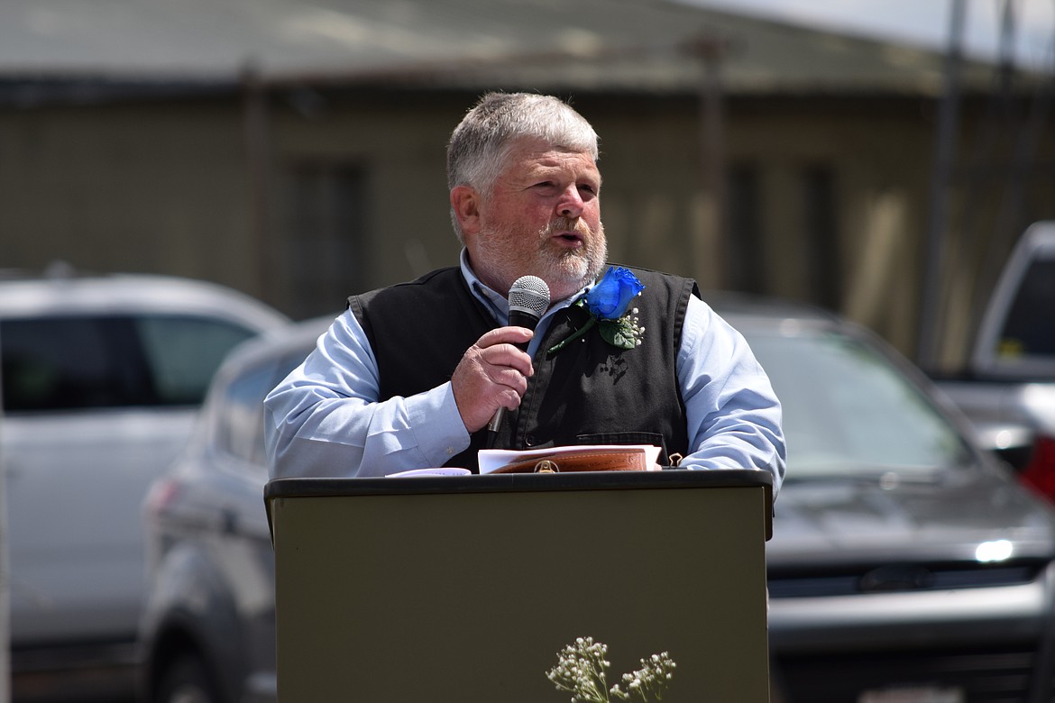 Longtime Wilson Creek High School vocational agriculture instructor Scott Mortimer speaking at the Wilson Creek School graduation ceremony on Saturday, June 12. Mortimer will start teaching with the Moses Lake School District this fall.