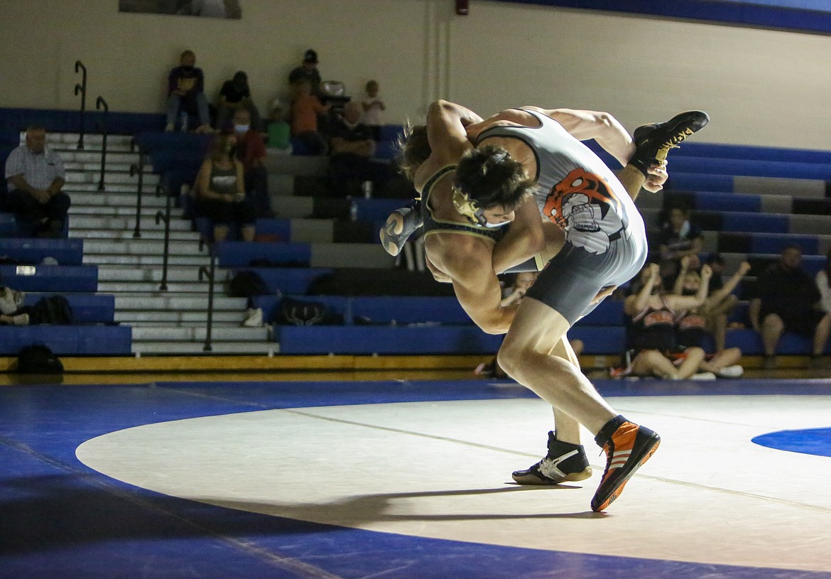 Ephrata High School's Kelvin Sager takes Royal High School's Erick Myrick to the mat in the dual event at Warden High School on Saturday, June 12.