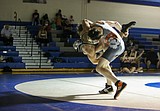 Wrestlers close season with mixed dual