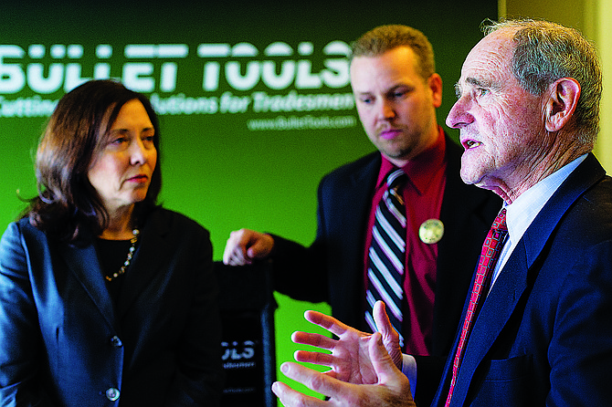 U.S. Sen. Jim Risch, right, discusses the level of cooperation between political parties in regard to growing small business as U.S. Sen. Maria Cantwell, far left, and Ben Toews, president of Bullet Tools listen.