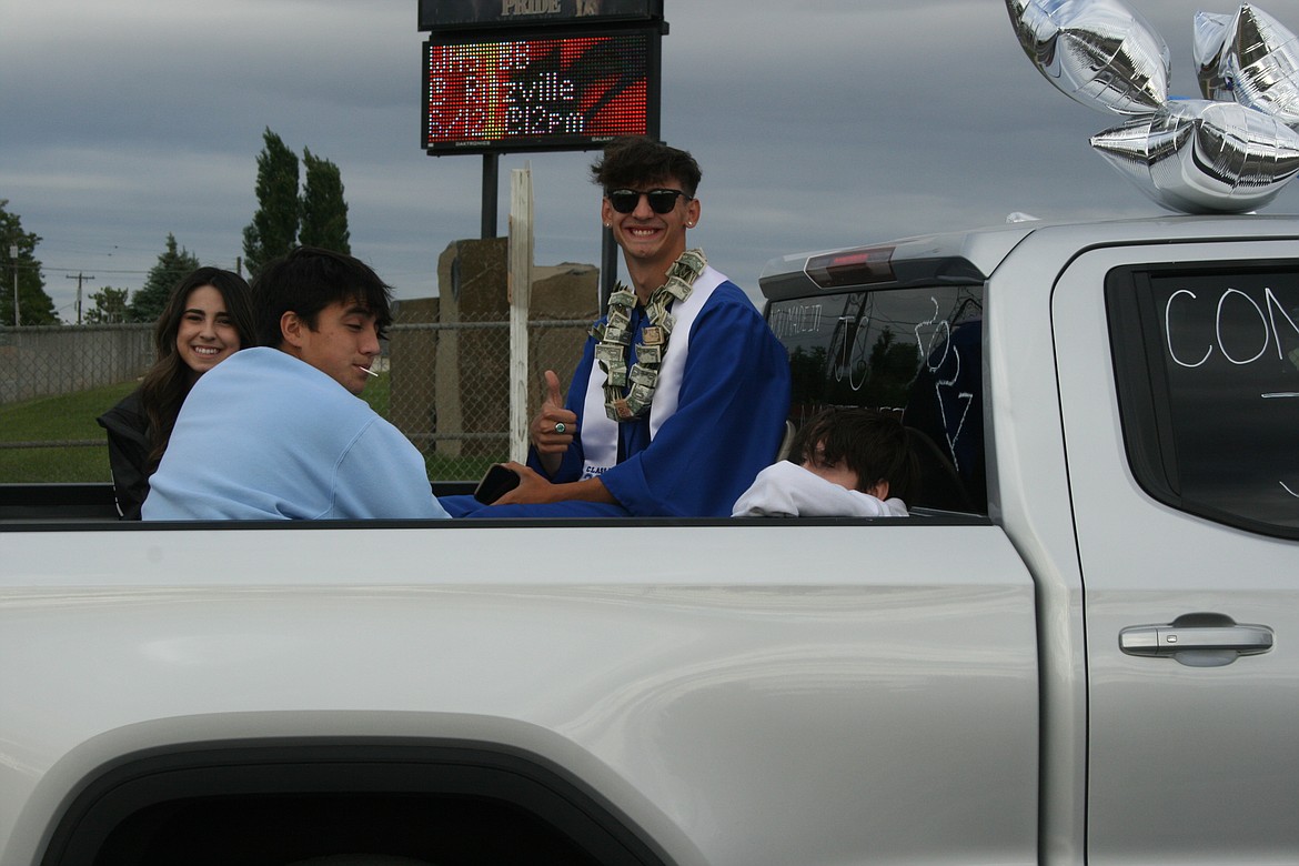 Seniors and their families drove through town with a pre-ceremony car parade at Warden High School  graduation June 11
