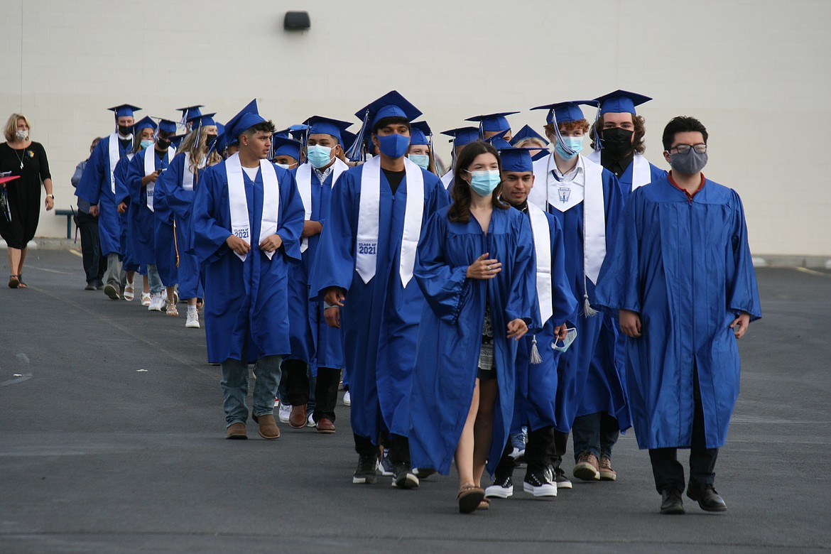 The Warden High School class of 2021 enters the stadium during graduation ceremonies June 11.