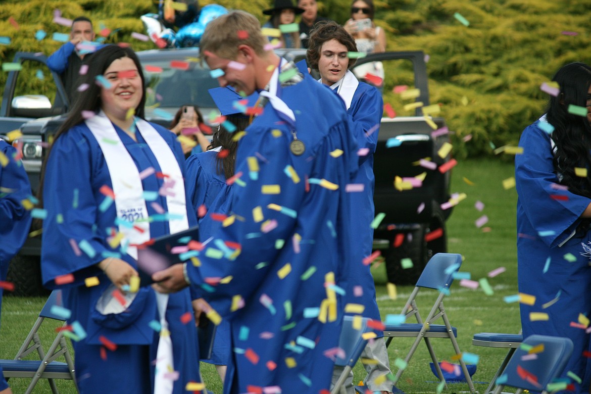 A shower of confetti is a tradition at Warden High School graduation, and tradition was upheld at the ceremony June 11.