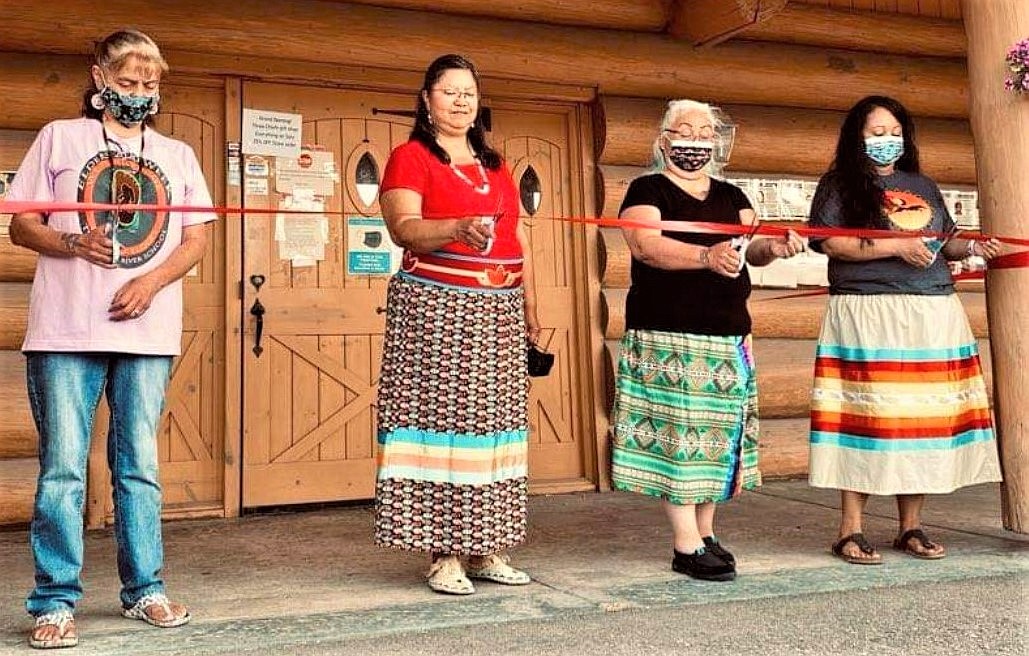 Cutting the ribbon to celebrate the grand opening of Three Chiefs Culture Center in St. Ignatius were, from left, Aggie Incashola, Marie Torosian, Geri Hewankorn and Loushie Charlo. They have worked tirelessly to recover artifacts from the People's Center fire last year, several of which are now on display. (Courtesy of Twila Irvin)