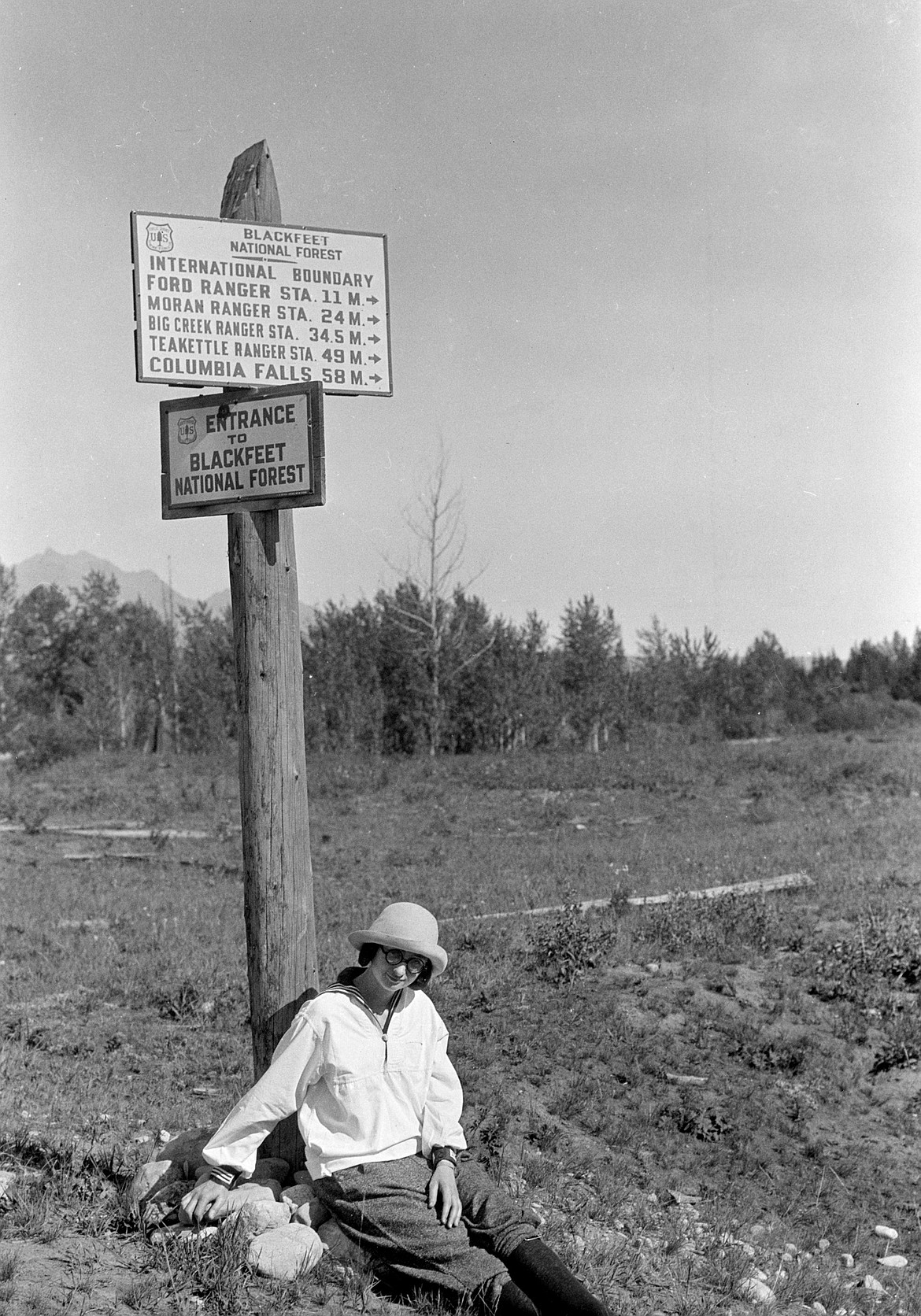 "Aunt Ruth" at the International Boundary in 1924. (Ferde Greene photo). There are about 400 Ferde Greene photos in the collection. Greene photographed Columbia Falls in the early 1900s.