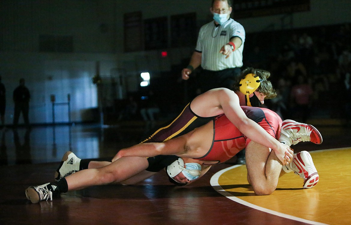 Moses Lake High School senior Hunter White works to keep his opponent from Sunnyside in the ring as he looks to score late in the match on Tuesday night in Moses Lake.