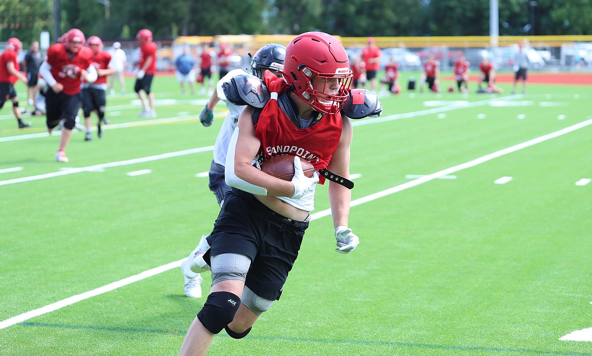 Arie VanDenBerg turns up field after securing a catch on Wednesday.