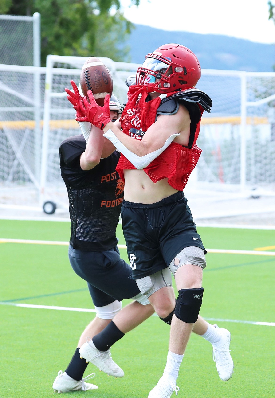 Wide receiver Cody Newhart attempts to haul in a touchdown catch on Wednesday.