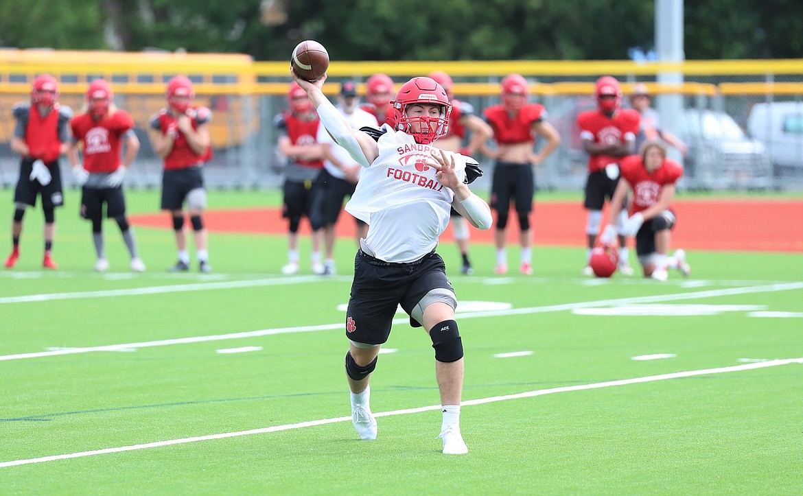 Quarterback Parker Pettit throws a pass into the end zone during a scrimmage against Post Falls on Wednesday.