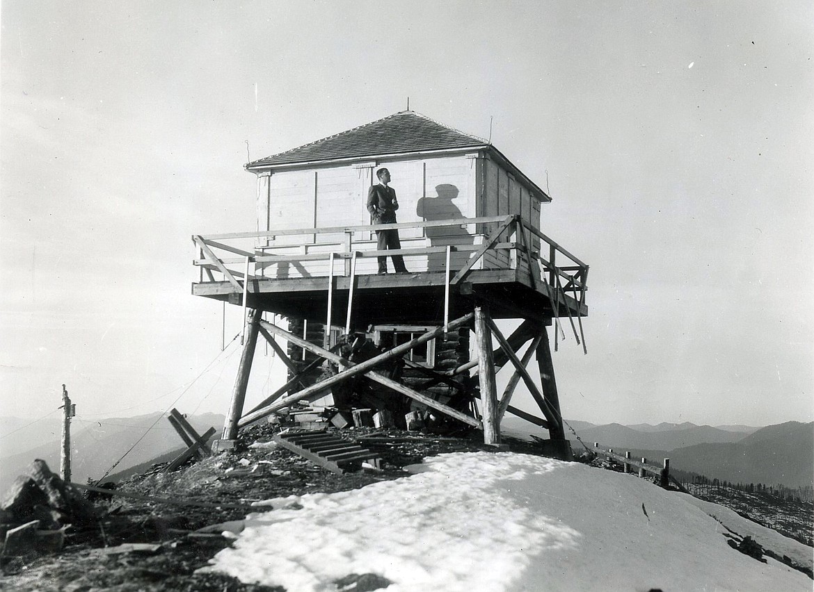 M.E. Boorman looks out from the Werner Peak Lookout at an elevation of 7,000 feet on October 21, 1941. (courtesy of the Northwest Montana Lookout Association)