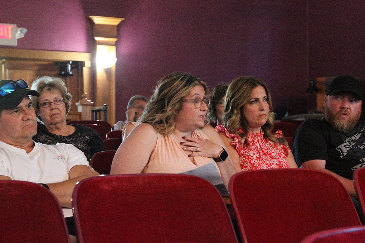 Amy Johnson, center, along other parents of Libby Public Schools students spoke out against a coronavirus vaccine incentive program promoted at local schools at June 14 school board meeting. (Will Langhorne/The Western News)