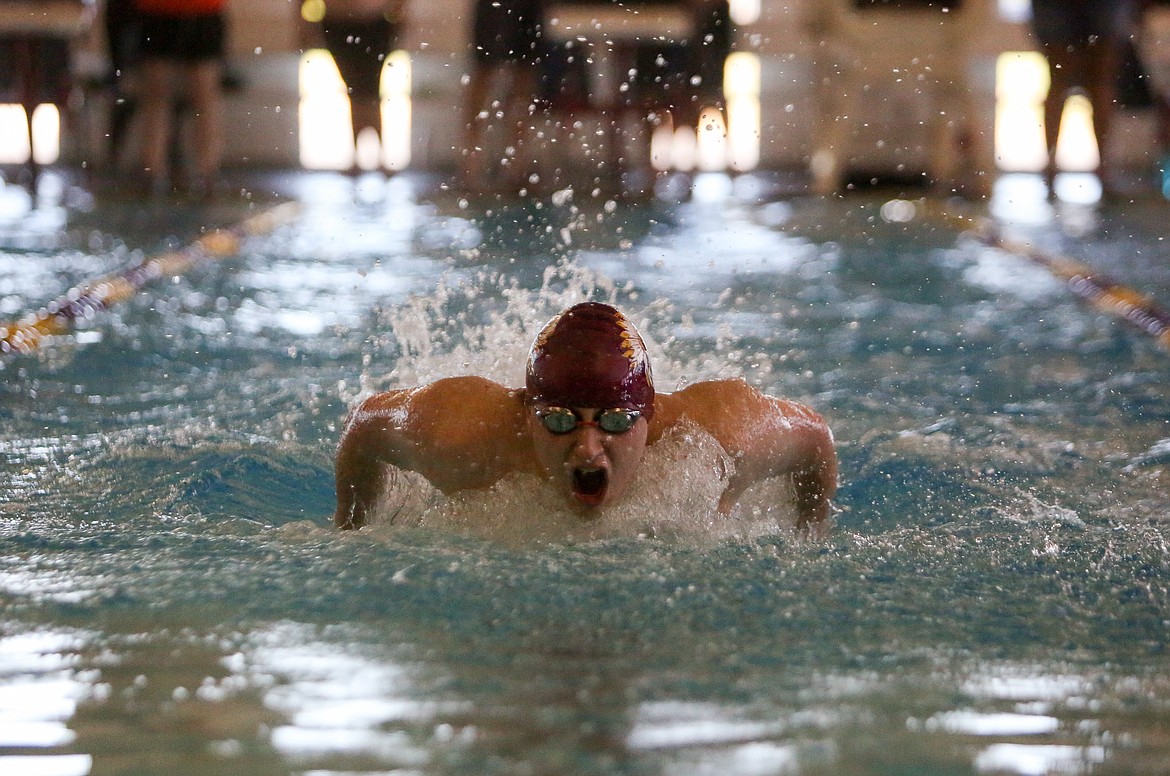 Moses Lake High School senior Cole Lindberg makes his way across the pool at MLHS on Thursday afternoon in the final heat of the 100 yard butterfly event.