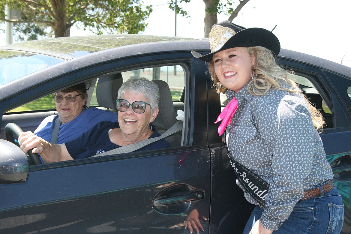 Moses Lake Roundup 2021 Queen Mykiah Hollenbeck poses for a picture with 1962 Roundup Queen Kathy Graff during the annual Senior Picnic Thursday at the Grant County Fairgrounds.