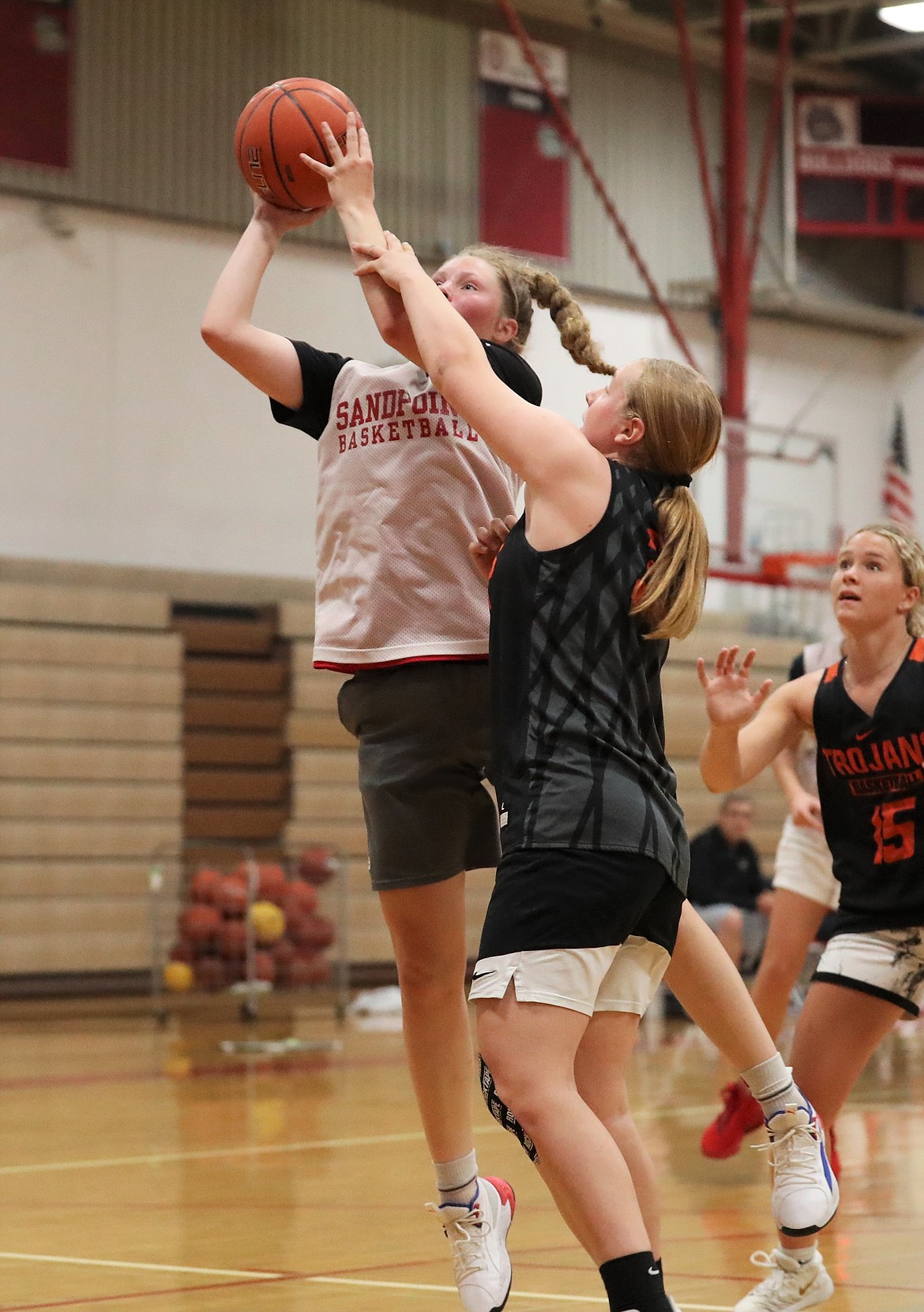 Karlie Banks fights through contact to attempt a shot on Tuesday.