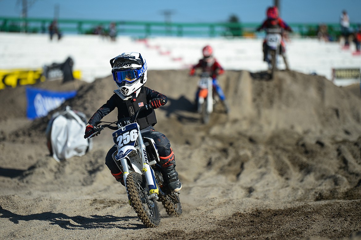 Riders compete during Top Dawg Arena Cross at the Northwest Montana Fairgrounds in Kalispell on Friday, June 18, 2021. (Casey Kreider/Daily Inter Lake)