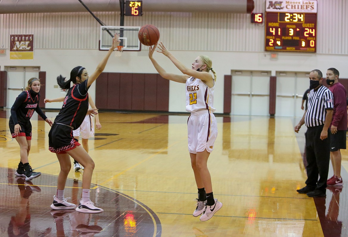 Moses Lake High School's Olivia Mayo shoots the three for the Chiefs in the second half of the 60-44 win over visiting Sunnyside High School Saturday afternoon at MLHS.