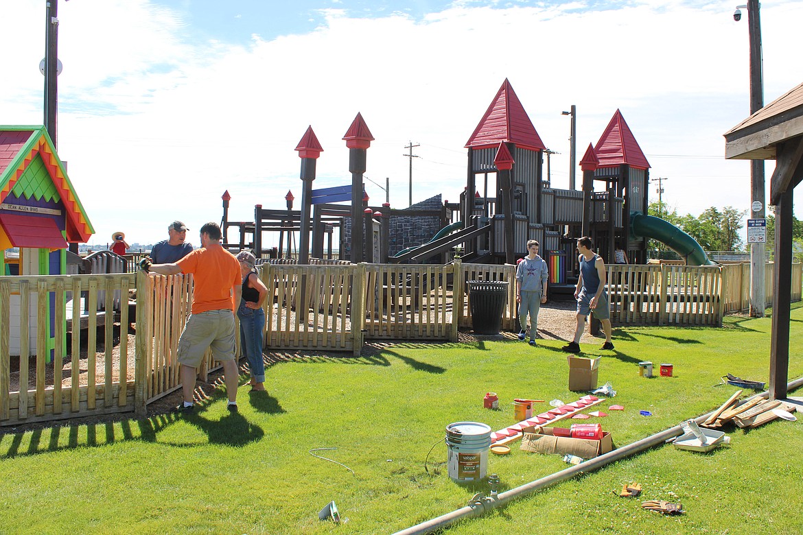 Around 30 volunteers came together Saturday for a Doolittle Dream Park makeover.