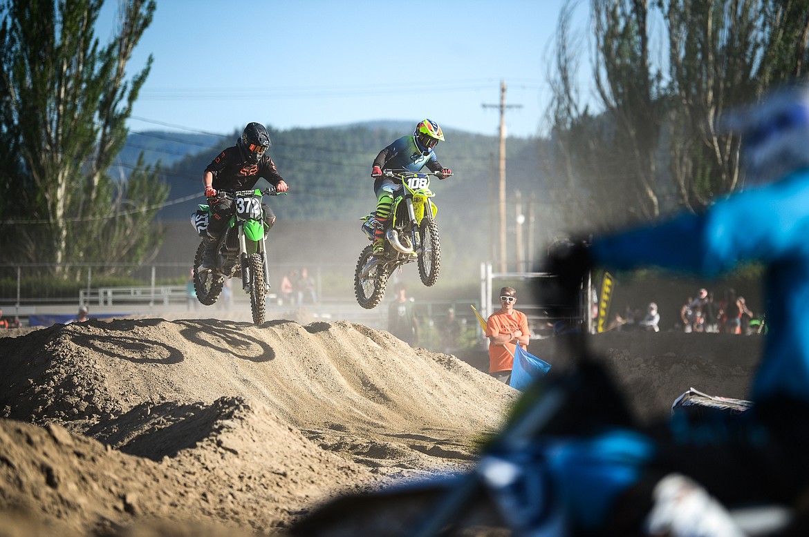 Riders compete during Top Dawg Arena Cross at the Northwest Montana Fairgrounds in Kalispell on Friday, June 18, 2021. (Casey Kreider/Daily Inter Lake)