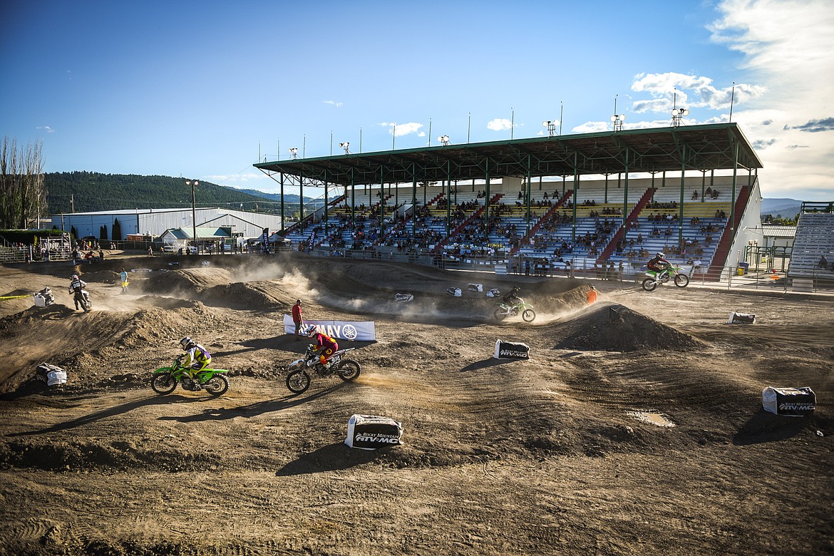 Riders compete during Top Dawg Arena Cross at the Northwest Montana Fairgrounds in Kalispell on Friday, June 18, 2021. (Casey Kreider/Daily Inter Lake)