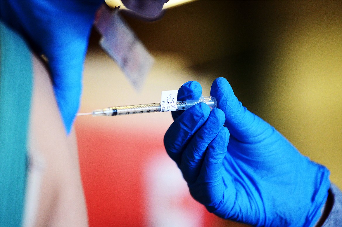 A second dose of the Pfizer Covid-19 vaccine is administered during the last vaccination clinic at the Flathead County Fairgrounds in this June 22, 2021, file photo. (Casey Kreider/Daily Inter Lake)