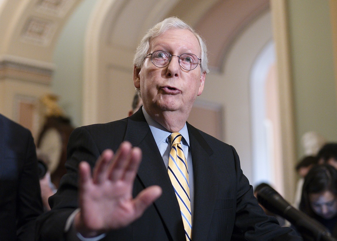 Senate Minority Leader Mitch McConnell, R-Ky., talks with reporters before a key test vote on the For the People Act, a sweeping bill that would overhaul the election system and voting rights, at the Capitol in Washington on Tuesday, June 22, 2021. The bill is a top priority for Democrats seeking to ensure access to the polls and mail in ballots, but it is opposed by Republicans as a federal overreach. (J. Scott Applewhite/Associated Press)